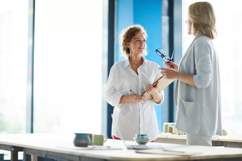 Two Women Discussing